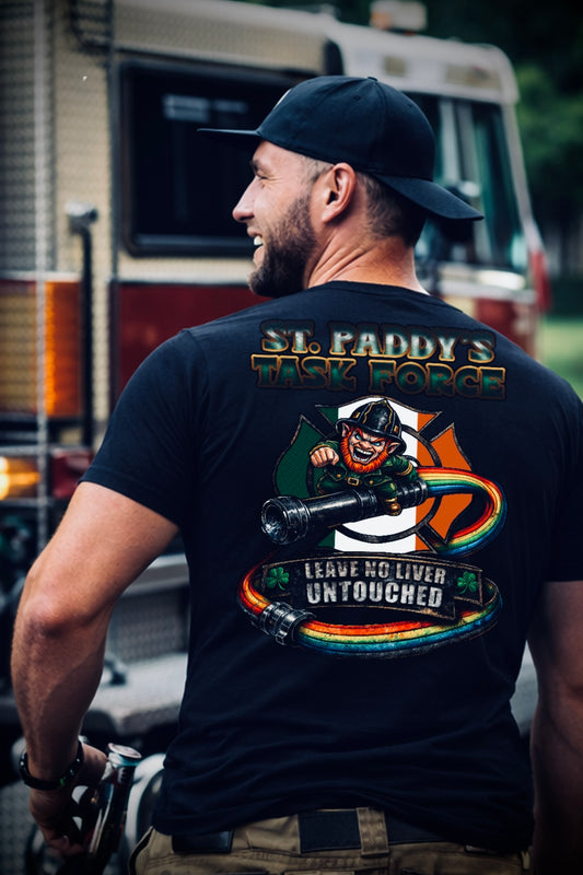 Man wearing a black t-shirt with 'St. Paddy's Back Porch' design, standing in front of a vehicle.