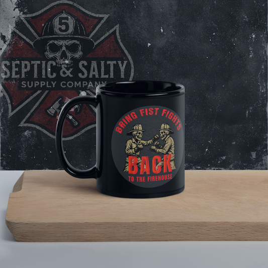 Black mug featuring two vintage firefighter skeletons squaring up to fight, placed on a wooden board with a distressed Septic & Salty firehouse skull logo painted on the wall behind it.
