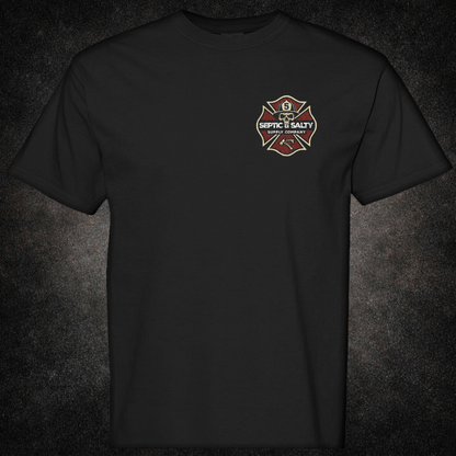 Black t-shirt front showing a small left-chest Septic & Salty Supply Company Maltese cross logo with a skull, crossed axes, and the number 5