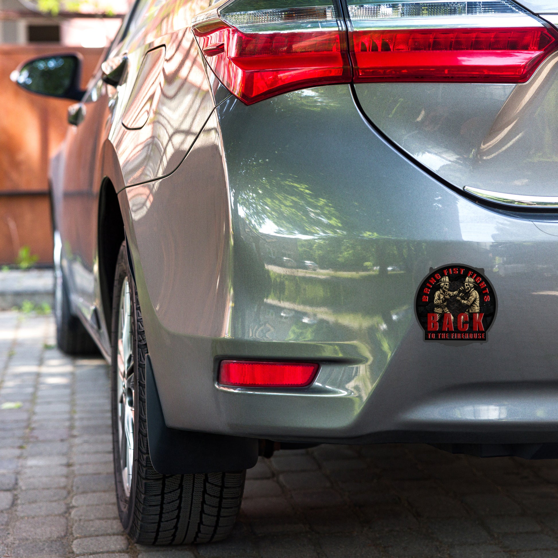 Round "Firehouse Fistfights" die-cut sticker showing bold red Maltese cross with black gloves and distressed "Bring Fist Fights Back to the Firehouse" lettering — firefighter humor vinyl sticker by Septic & Salty Supply Co.
