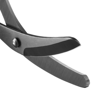 Close-up of a pair of black-handled scissors on a white background