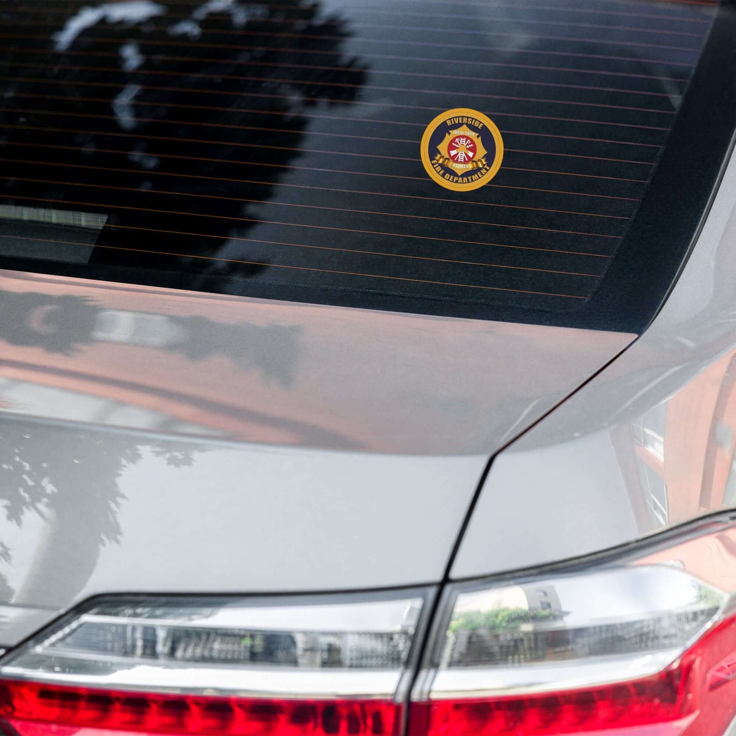 Retiree Sticker displayed on the rear window of a vehicle, ideal for fire service and firefighter humor.