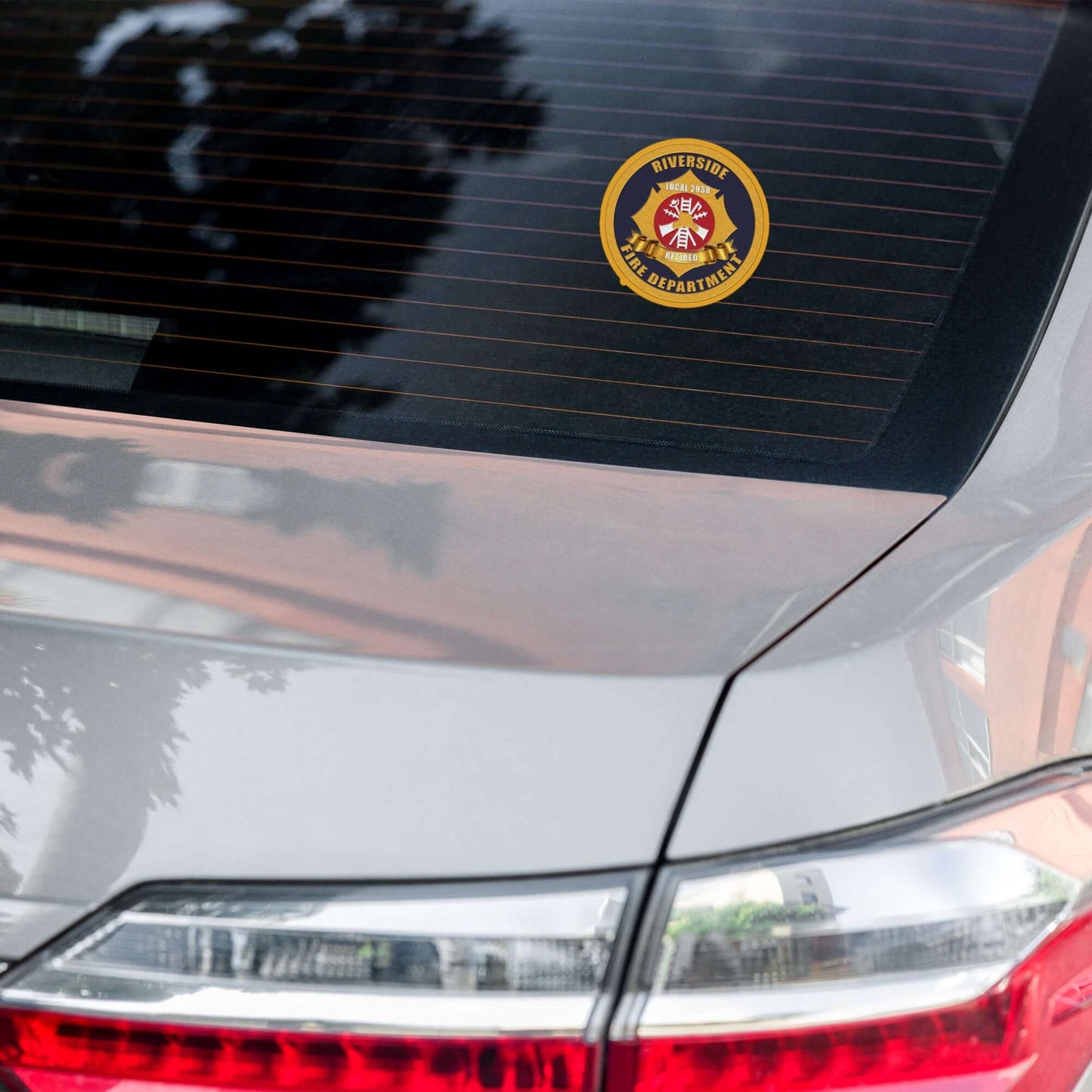 Retiree Sticker on a car window, showcasing fire service pride and firehouse humor.