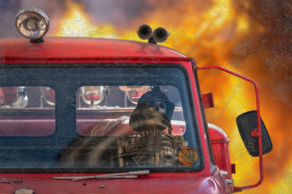 Red fire truck with flames in the background